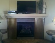 Built-In Gas Fireplace With Tin Surround
